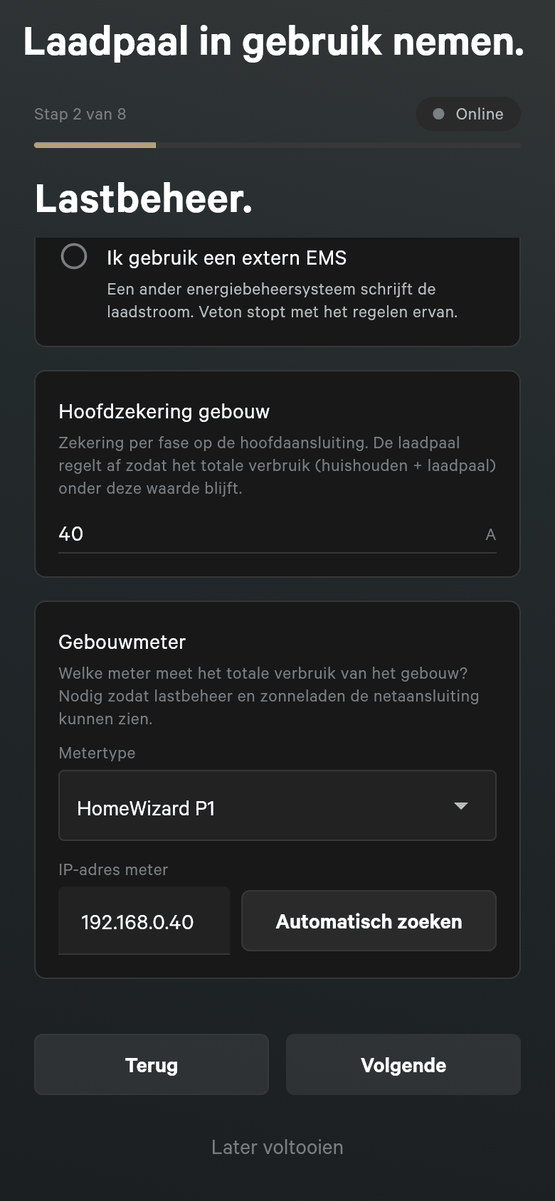 Installatiestap 2 van 8, Lastbeheer, met de optie Ik gebruik een extern EMS, een veld Hoofdzekering gebouw met 40 A, en een kaart Gebouwmeter met het metertype HomeWizard P1, een IP-adres van de meter en een knop Automatisch zoeken