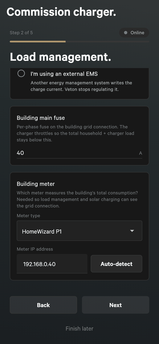 Setup step 2 of 5, Load management, with the option I'm using an external EMS, a Building main fuse field showing 40 A, and a Building meter card with the meter type HomeWizard P1, a meter IP address and an Auto-detect button