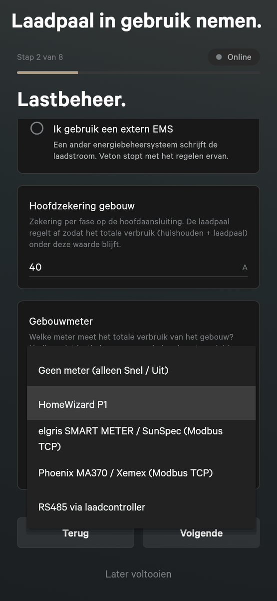 De lijst Gebouwmeter geopend op installatiestap 2, met de keuzes Geen meter (alleen Snel / Uit), HomeWizard P1, elgris SMART METER / SunSpec (Modbus TCP), Phoenix MA370 / Xemex (Modbus TCP), en RS485 via laadcontroller